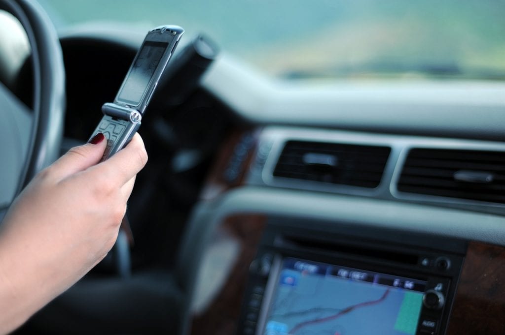 driving-844132_1280 lakeland collision repair shop - distracted driving